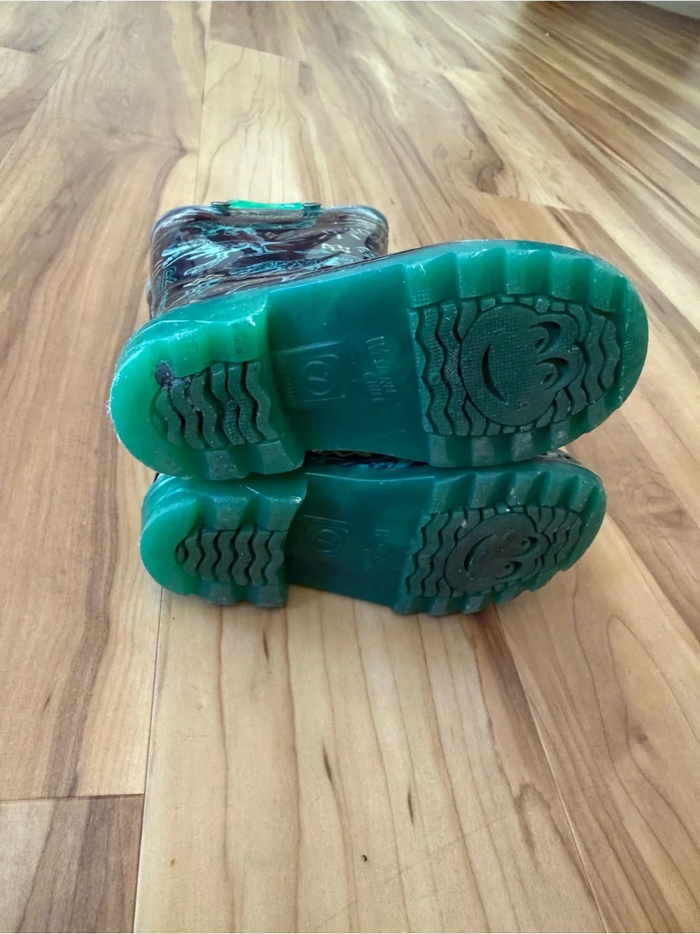 Western Chief Charcoal Rain Boots with Teal Dinosaur Accents